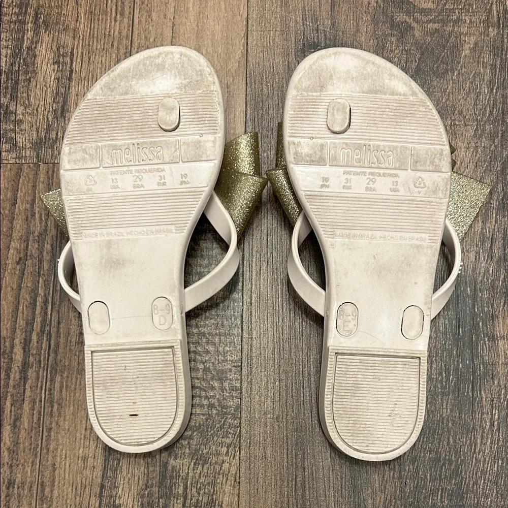 Mel, Dreamed by Melissa Cream Sandals with Gold Bow harmonic bow III